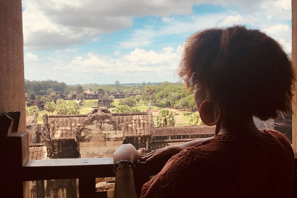 A person overlooking old buildings